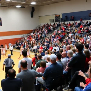 Basketball players in action during the Small College Basketball Hall of Fame Classic