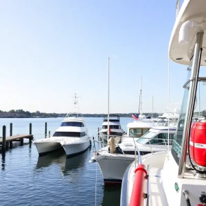 View of the Augusta Riverwalk with docked houseboats, emphasizing safety equipment.