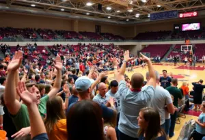 Fans cheering at Augusta University Basketball game